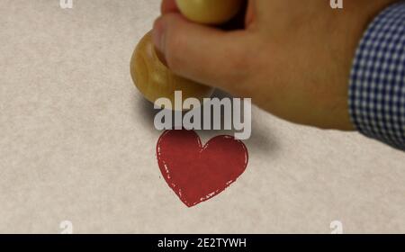 Herz Gesundheit und Liebe Symbol Stempel und Stempelhand. Romantisches, Herz, Feier Botschaft Konzept. Stockfoto