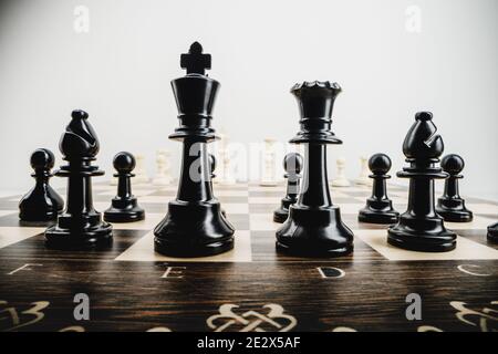 Macro photo of chess pieces on a chess board Stockfoto