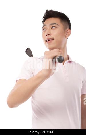 Porträt des jungen männlichen Golfers mit Schläger über Schulter hoch Hochwertige Fotos Stockfoto