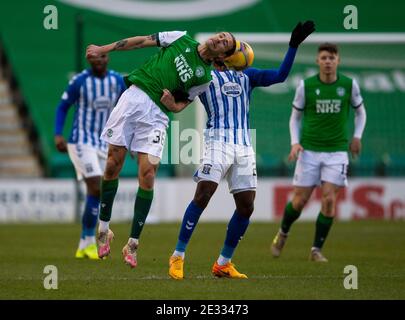 Scottish Premiership - Hibernian / Kilmarnock. Easter Road Stadium, Edinburgh, Midlothian, Großbritannien. Januar 2021. Hibs spielen Gastgeber von Kilmarnock in der Scottish Premier League an der Easter Road in Edinburgh. PIC Shows: HibsÕ Australischer Nationalspieler Jackson Irvine, wird besser als Kilmarnock Mittelfeldspieler Youssouf Mulumbu. Kredit: Ian Jacobs/Alamy Live Nachrichten Stockfoto