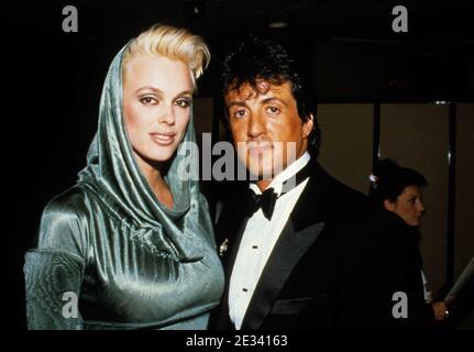 Sylvester Stallone und Brigitte Nielsen 1986 Quelle: Ralph Dominguez/MediaPunch Stockfoto