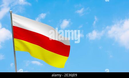 südossetien Flagge auf Stange. Blauer Himmel. Nationalflagge von südossetien Stockfoto