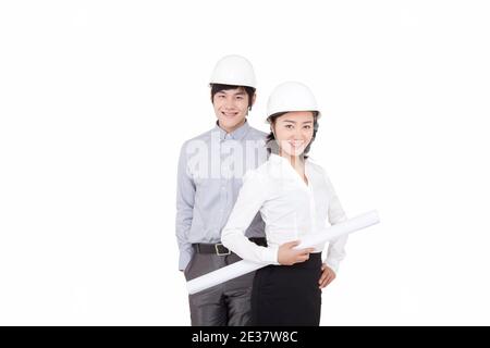 Portrait von Geschäftsmann und Geschäftsfrau trägt Harthüte hohe Qualität Foto Stockfoto
