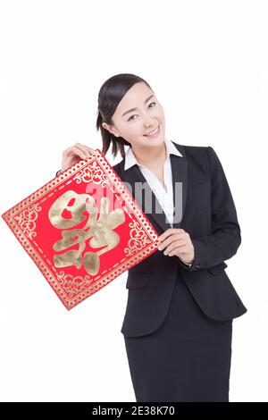 Business Frau hält Chinesisch Good Luck Fu qualitativ hochwertige Foto Stockfoto