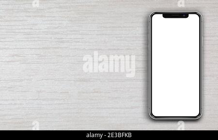 Smartphone mit leerem leeren Bildschirm auf weißem Holz Hintergrund Stockfoto