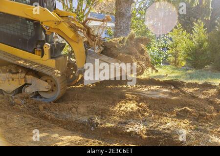Der Bulldozer bewegt Bodengräberbaugeräte Stockfoto