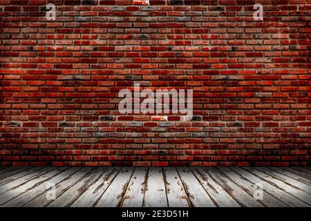 Leere Ziegelwand und Holzboden für Hintergrund blanker Holzboden für Hintergrund Montage Design. Stockfoto