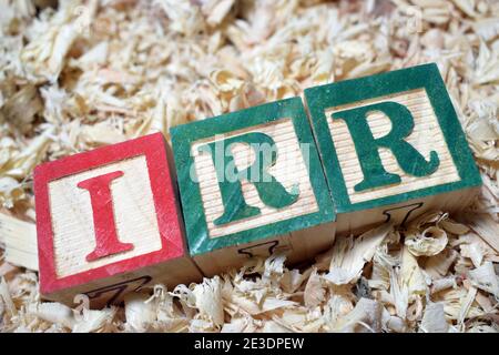 Internal Rate of Return (IRR) acronym arranged with wooden blocks Stockfoto