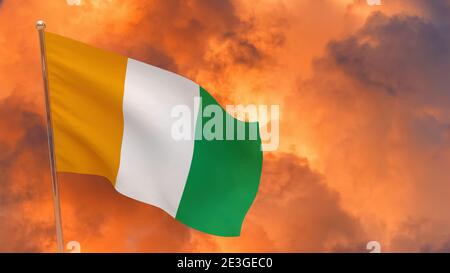 Cote d'ivoire - Elfenbeinküste Flagge auf Stange. Dramatischer Hintergrund. Nationalflagge der Elfenbeinküste Stockfoto