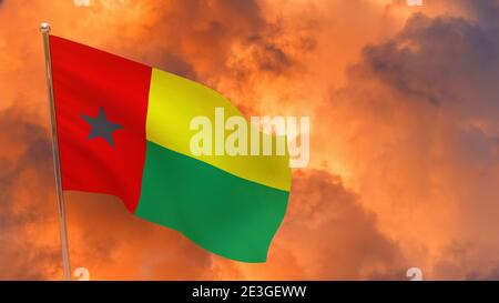 Guinea-Bissau Flagge auf Mast. Dramatischer Hintergrund. Nationalflagge von Guinea-Bissau Stockfoto