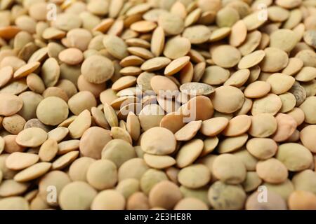 Ungekochte Hülsenfrüchte auf dem ganzen Hintergrund, Nahaufnahme Stockfoto