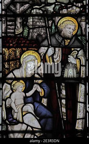 Ein Buntglasfenster von C E Kempe & Co., das die Geburt Christi, die St. Andrew's Church, Weissendine, Rutland darstellt Stockfoto
