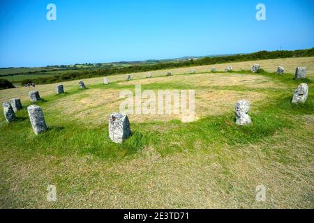 Die Merry Maidens of Boleigh Stone Circle, bestehend aus 19 Steinen und auch bekannt als Dawn's Men, liegt zwischen Lamorna und St. Buryan in Cornwall Stockfoto