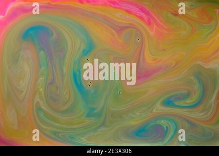Farbige Flüssigkeiten gemischt in Flüssigkeit schaffen bunte abstrakte Hintergrund Stockfoto