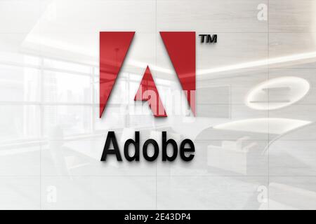 adobe-Logo auf reflektierender Business-Wandtafel Stockfoto