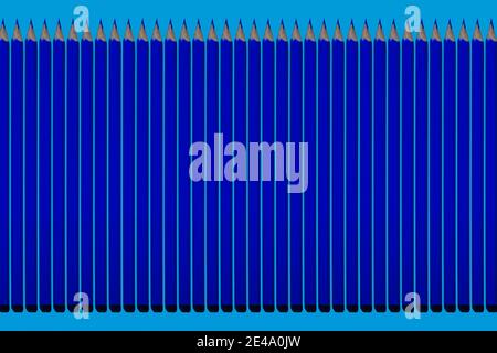 Muster aus dunkelblauen Bleistiften auf blauem Hintergrund Stockfoto