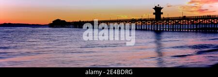 Seal Beach Pier bei Sonnenuntergang, Seal Beach, Orange County, Kalifornien, USA Stockfoto