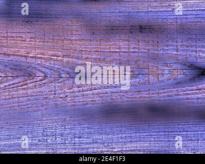 Weathered Board in Blue - Nahaufnahme der Seite eines alten Nebenhauses, digital manipuliert, um mehr blaue Farbe hinzuzufügen. Stockfoto