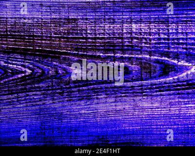 Verwittertes Brett in Blau und Rot - Nahaufnahme der Seite eines alten Nebenhauses, digital manipuliert, um mehr blaue und rote Farbe hinzuzufügen. Stockfoto