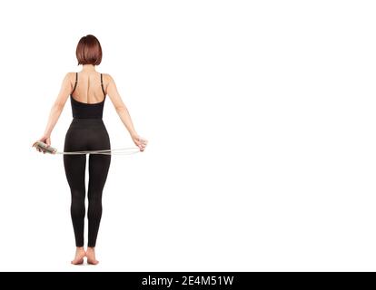 Junge schöne Frau in schwarzen Leggings und Top-Sport und Yoga im Haus, auf weißem Hintergrund, zu isolieren Stockfoto