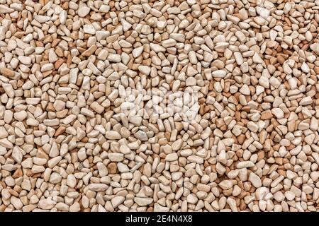 Kleine natürlich polierte graue Kieselsteine Hintergrund Stockfoto