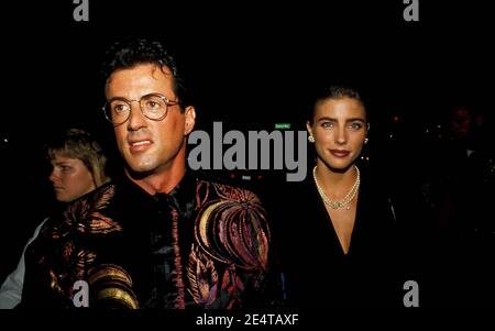 Sylvester Stallone und Jennifer Flavin 1990 Quelle: Ralph Dominguez/MediaPunch Stockfoto