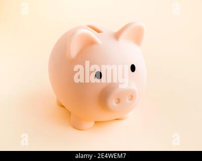 Niedliches Sparschwein, rosa Farbe isoliert auf weichem beigen Hintergrund. Geld sparen, Investition und Finanzierung Konzept. Stockfoto
