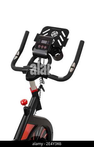 Nahaufnahme des sich drehenden Fahrrads isoliert auf weißem Hintergrund. Gesunder Lebensstil. Fitness, Sport, Training zu Hause. Stockfoto