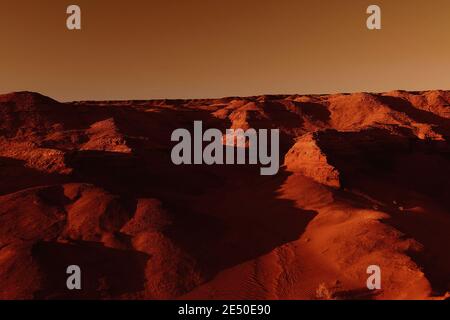 Fantastische marslandschaft in rostigen Orangetönen, Marsoberfläche, Wüste, Klippen, Sand. Fremde Landschaft. Roter Planet mars. Stockfoto