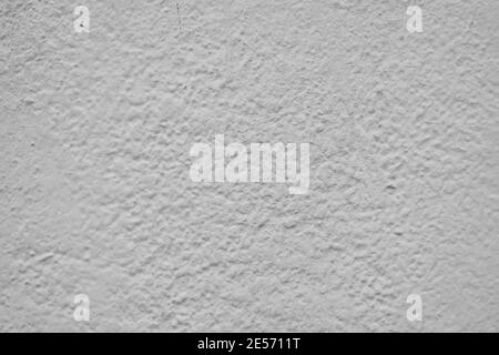 Hell verputzte Wand mit Defekten Textur aus der Nähe Stockfoto