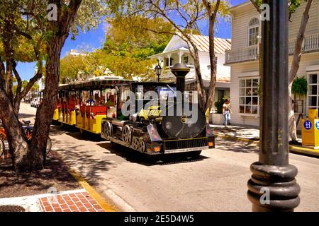 Conch Tour Train, unterhaltsame Besucher seit 1958. Kein Key West Urlaub ist komplett ohne die World Famous Conch Train Tour zu buchen. Key West, Florida Stockfoto