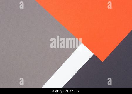 Kreative abstrakte geometrische Papier Hintergrund orange, weiß, hellgrau, schwarz Farben Papier Stockfoto