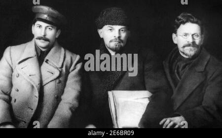 Joseph Stalin, Wladimir Lenin und Michail Kalinin auf dem VIII. Parteitag der Russischen Kommunistischen Partei, Moskau, 1919. Stockfoto