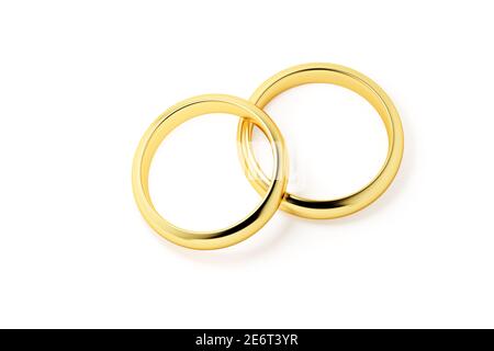 Zwei goldene Eheringe isoliert auf weißem Hintergrund. Stockfoto