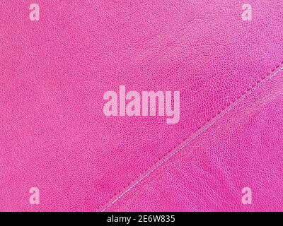 Fuchsia Leder genäht Faden. Textur und Hintergrund. Draufsicht Stockfoto