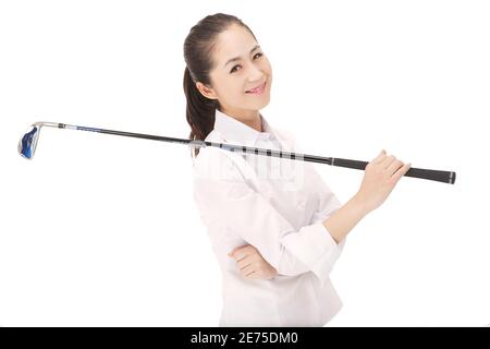 Junge Frau spielt Golf hohe Qualität Foto Stockfoto