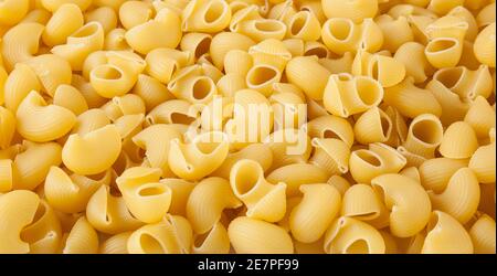 Ungekocht Pipe Rigate pasta Hintergrund Stockfoto