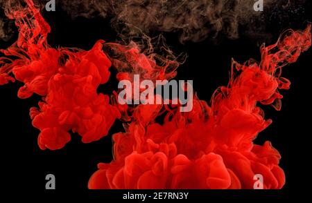 Rote abstrakte Textur auf Schwarz. Stockfoto