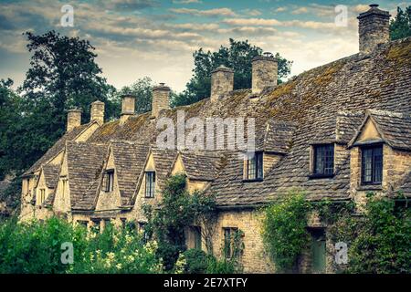 Cottages in Arlington Row in Bibury, Gloucestershire in den Cotswolds, England, Großbritannien Stockfoto