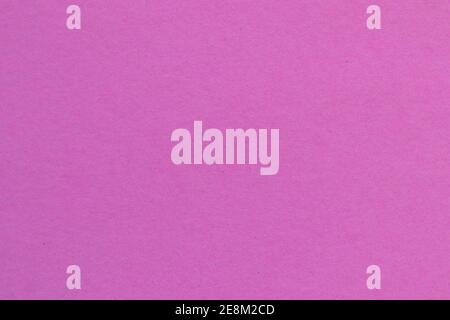 Nahaufnahme von Hintergrund und Textur von rosa gefleckten Papieren. Pinkes Papier mit Papierstreifen. Stockfoto