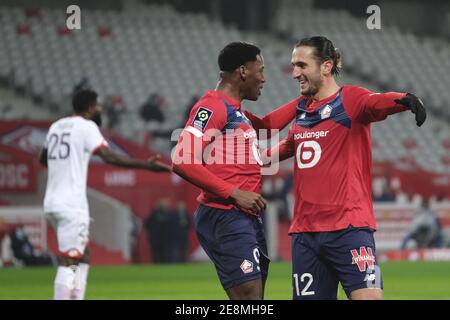 Villeneuve D'Ascq, Frankreich. Januar 2021. Joy of Lille Stürmer YUSUF YAZICI nach dem Tor seiner Mannschaft während der Französisch Ligue 1 Fußball-Meisterschaft Uber isst Lille gegen Dijon FCO St Pierre Mauroy Stadium - Villeneuve d'Ascq .Dritte Welle von COVID-19 in Frankreich : Die französische Regierung hat eine Ausgangssperre um 18.00 Uhr beschlossen, sowie alle Sportveranstaltungen werden ohne Zuschauer gespielt werden, bis auf weiteres.Lille OSC gewann 1:0 Credit: Pierre Stevenin/ZUMA Wire/Alamy Live News Stockfoto