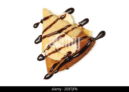 Crepes mit Schokoladensauce und Banane isoliert auf weißem Hintergrund Stockfoto