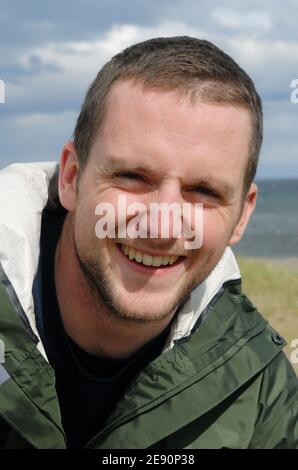 Antarctic Ice Marathon & 100k 2007, vom 8. Bis 23. Dezember 2007, von Punta Arenas (Chile) nach Patriot Hills (Antarktis). Hier sieht man den irischen Mark Scanlon: Ein 24-Jähriger, der in sieben Monaten sieben Marathons auf sieben Kontinenten laufen lässt. Mark hat bereits den San Francisco Marathon (USA), Longford Marathon (Irland), Sydney Marathon (Australien), Nairobi Marathon (Kenia), den Buenos Aires Marathon (Argentinien) und jetzt den Antarctic Ice Marathon laufen lassen, der auf dem zweiten Platz landet. Er wird den Munbai Marathon (Indien) laufen, um seine Herausforderung zugunsten der Irish Cancer Society zu bewältigen Stockfoto