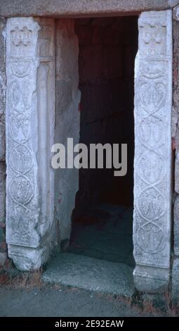Ruinen einer römischen Kolonie Emerita Augusta in Merida, Badajoz, Spanien. Alcazar - Details auf einem Steintürrahmen. Archivscan von einem Dia. Oktober 1979. Stockfoto