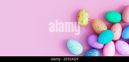 Bunte Eier auf einem rosa Osterhintergrund 3D Rendering Stockfoto