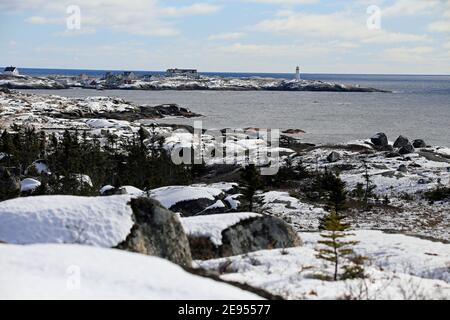 Peggy's Point Leuchtturm im Winter; Peggy's Cove; Nova Scotia; Kanada Stockfoto