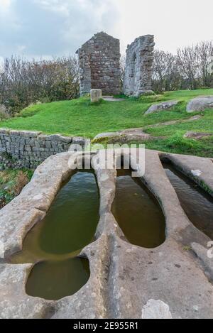 Felsgräber in der St. Patrick's Kapelle in Heysham Stockfoto