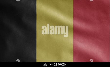 Belgische Flagge winkt im Wind. Nahaufnahme von Belgien Banner weht, weiche und glatte Seide. Stoff Stoff Textur Fähnrich Hintergrund. Verwenden Sie es für nationale Stockfoto