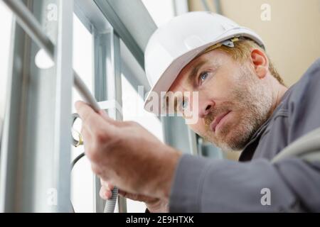 Portrait von Builder die Durchführung von Verbesserungen Home Stockfoto