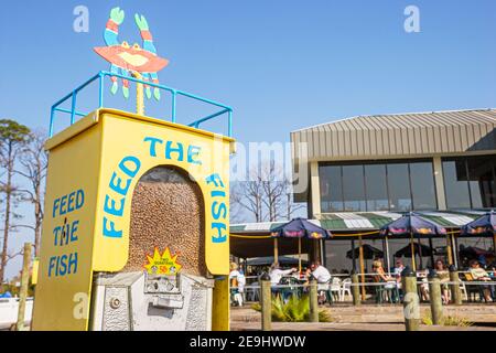 Alabama Orange Beach Zeke's Landing Fisch-Futterautomaten, Cotton Bayou, Restaurant, Stockfoto